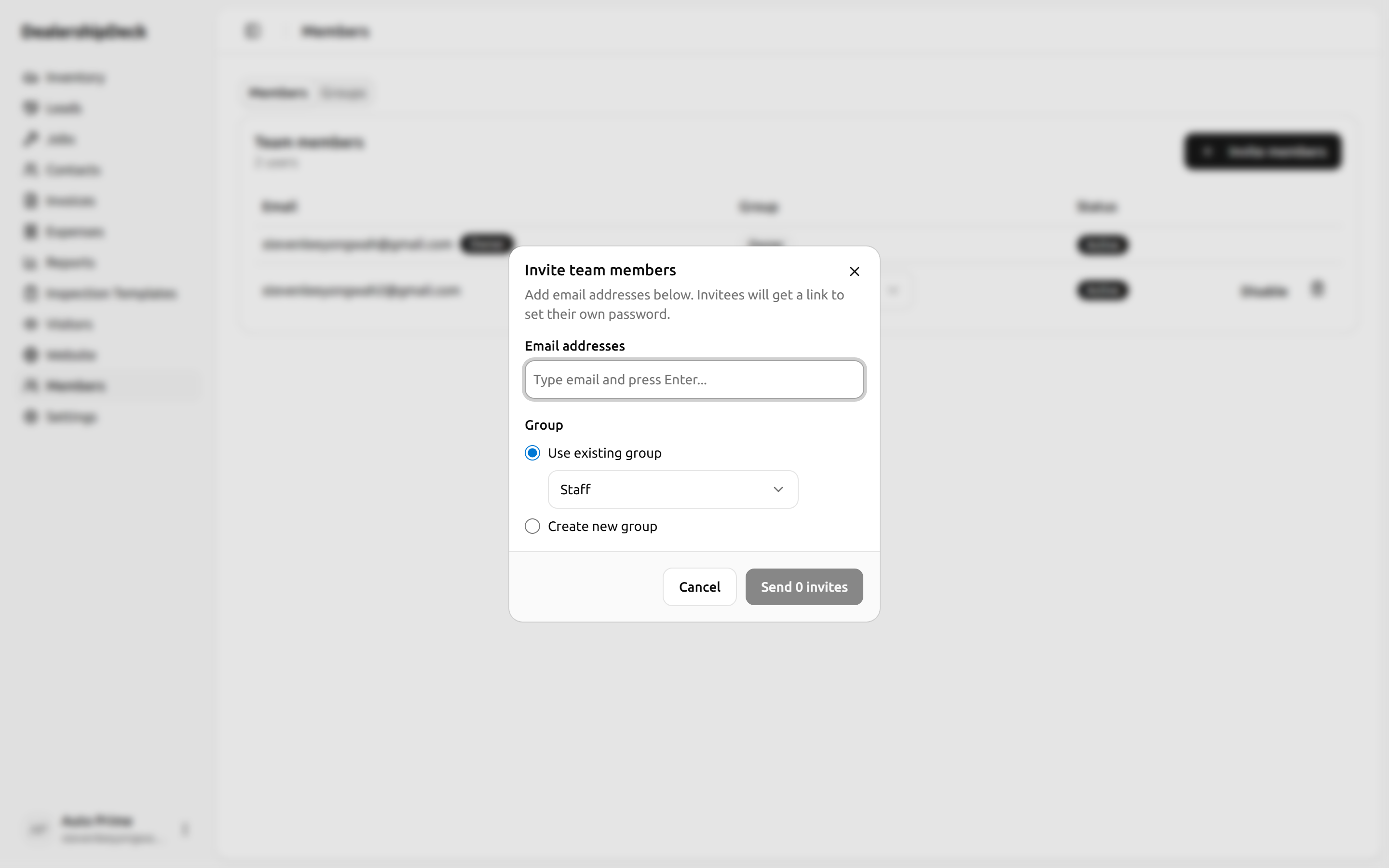 The Invite users dialog with two email addresses entered and a Group dropdown set to 'Sales'.